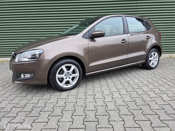 Bruine Volkswagen Polo 1.2 TSI uit 2012